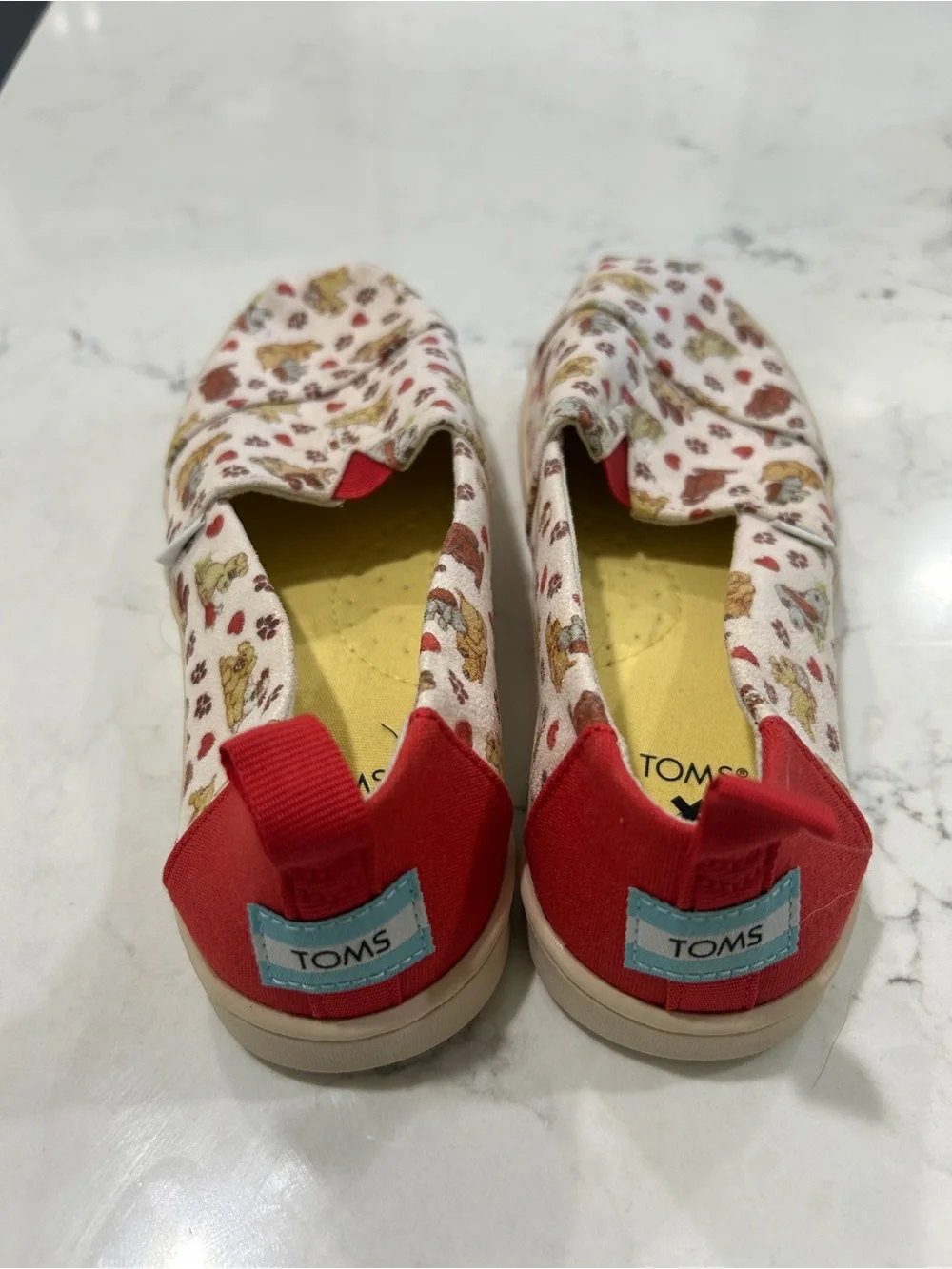 Toms Kids Cream Canvas Slip-Ons with Red Accents and Dog Print